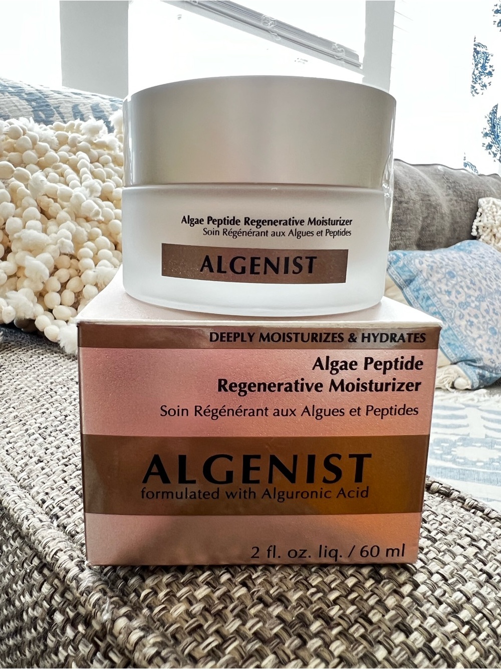 Algenist Moisturizer in Rose Gold and White